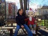 Photo of study abroad student Jimmy's friend with a statue of a German cartoon character in Erfurt